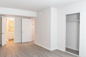 Sparks apartment for rent - A white room with a doorway leading to another room.