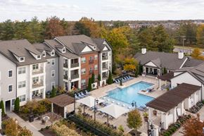 Murfreesboro apartment for rent - an aerial view of an apartment complex with a swimming pool