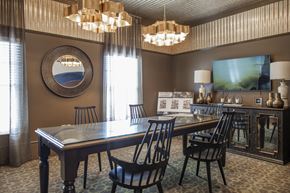 Murfreesboro apartment for rent - a dining room with a table and chairs and a television