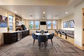 Loveland apartment for rent - a dining room with a table and chairs