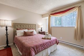 Colorado Springs apartment for rent - a bedroom with a bed and a window