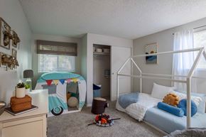 Olympia apartment for rent - A child's bedroom with a bunk bed and a play tent.