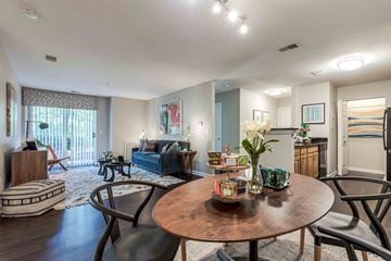 Frederick apartment for rent - a living room with a round table and a couch