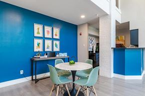Laurel apartment for rent - a dining room with blue walls and a table and chairs