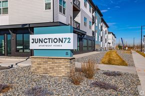 Commerce City apartment for rent - A modern apartment complex named Junction 72 is shown in the image.