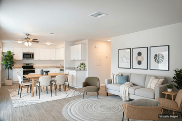 Sparks apartment for rent - A modern living room with a dining table and chairs.