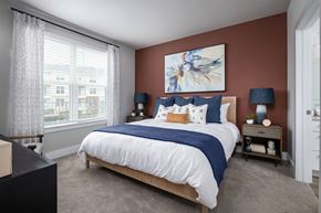 Fredericksburg apartment for rent - a bedroom with a bed and a window