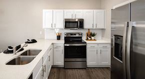 Clarksville apartment for rent - Kitchen with white cabinetry