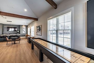 Columbia apartment for rent - A modern kitchen with a dining table and chairs.