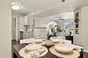 Broomfield apartment for rent - A dining room with a table set for a meal.