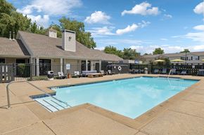 Gallatin apartment for rent - A large swimming pool with a slide in the middle of it.