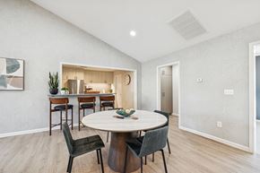La Vergne apartment for rent - A modern dining room with a round table and chairs.