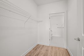 Nashville apartment for rent - a bedroom with a closet and a door to a bathroom