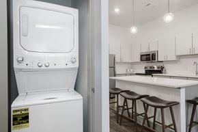 Nashville apartment for rent - A white oven with a sticker on it is in a kitchen.