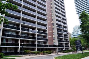 Toronto apartment for rent - A tall apartment building with balconies and a sign that reads 1777.