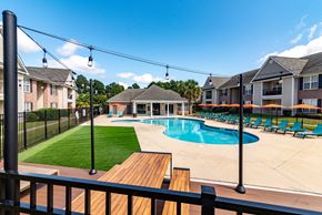 Fayetteville apartment for rent - our apartments have a large pool and deck with chairs