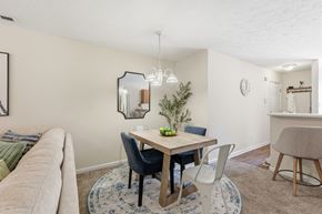 Fayetteville apartment for rent - A dining room with a table and chairs.