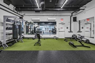 Columbia apartment for rent - A gym with a green floor and white walls.