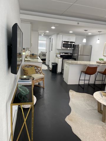 Columbia apartment for rent - A modern kitchen with a white countertop and stainless steel appliances.