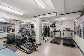 Portland apartment for rent - the gym is equipped with cardio equipment and weights at Celio Apartments, Portland, Oregon