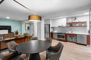 Portland apartment for rent - a kitchen and dining room with a table and chairs at Celio Apartments, Oregon