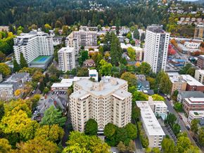 Portland apartment for rent - an aerial view of a city with buildings and trees at Celio Apartments, Portland
