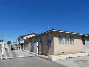 Oxnard apartment for rent - a house with a white fence in front of it