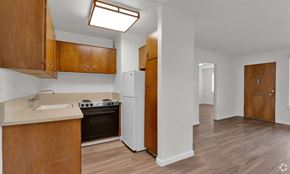 Sacramento apartment for rent - the view of a kitchen with a stove and a refrigerator