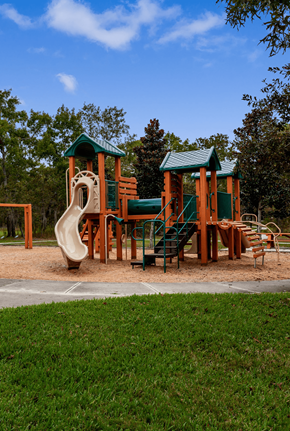 Rapid City apartment for rent - A playground with a green roof and a slide.