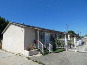 Oxnard apartment for rent - a small white house with a white fence