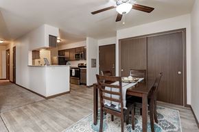 Stoughton apartment for rent - A dining room with a table set for four.