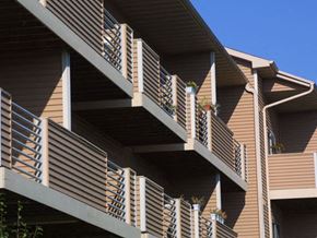 Neenah apartment for rent - a building with a balcony and a blue sky