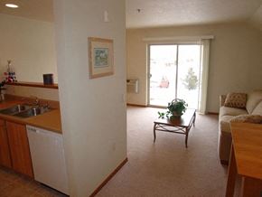 Neenah apartment for rent - a living room with a couch and a table