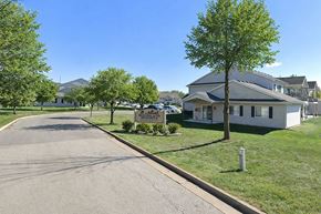 Newton apartment for rent - A residential street with houses and trees.