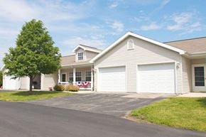 Fond Du Lac apartment for rent - a white house with a flag on the front of it