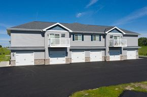 Horicon apartment for rent - a white house with white doors and a black road