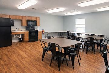 Quincy apartment for rent - A kitchen area with a dining table and chairs.