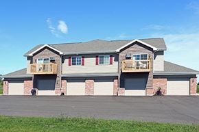 Grafton apartment for rent - a house with two balconies and a parking lot