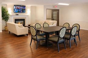 Sumter apartment for rent - A living room with a fireplace and a television.