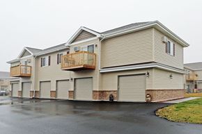 Fond Du Lac apartment for rent - A large house with a balcony and a garage.