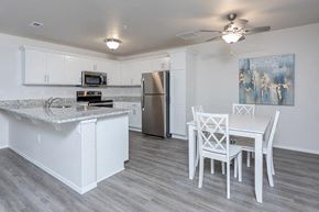 Waterford apartment for rent - A kitchen with a marble countertop and a refrigerator.