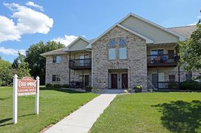 Neenah apartment for rent - a house with a sign in front of it