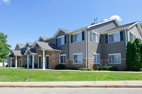 Kalamazoo apartment for rent - a row of houses on the side of a street