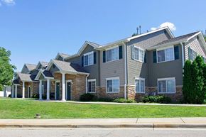 Kalamazoo apartment for rent - a row of houses on the side of a street