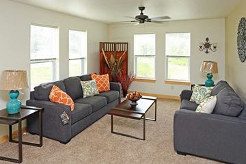 Waukesha apartment for rent - a living room with couches and a coffee table