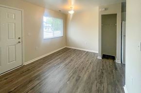 Bangor apartment for rent - A room with a white door and a window with a view of the outside.