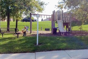 Chilton apartment for rent - a park with a playground and a swing set