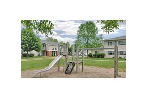 Howard apartment for rent - a playground with a slide in a park