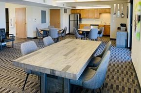 Mason City apartment for rent - a conference room with a large table and chairs
