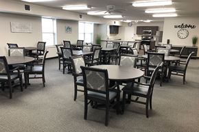 Clear Lake apartment for rent - a large dining room with tables and chairs and a kitchen